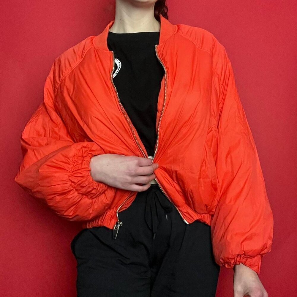 Neon orange puffer jacket​​​​​​​​​​​​​​​